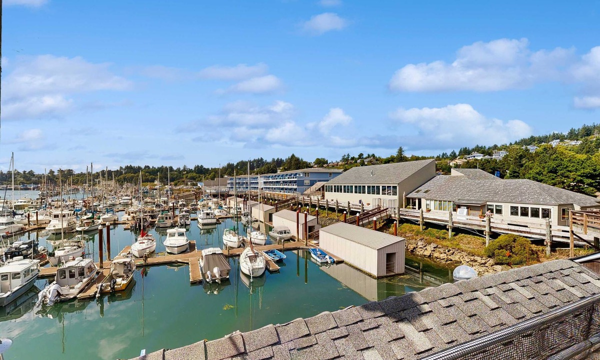 Historic Bayfront Condo | Delightful Harbor Perch Near Town with Shared pool & hot tub & Private Balcony
