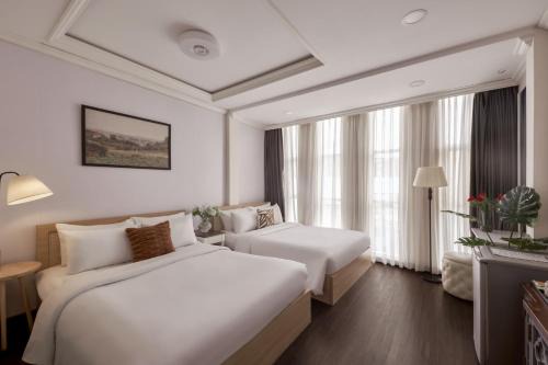 Nguyen Thai Binh Hotel | Quy Hung Hotel - Ben Thanh Market