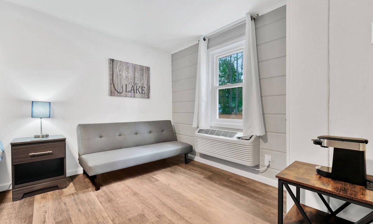 Houghton Lake Hotel | Room #4: Updated King Suite w/small couch