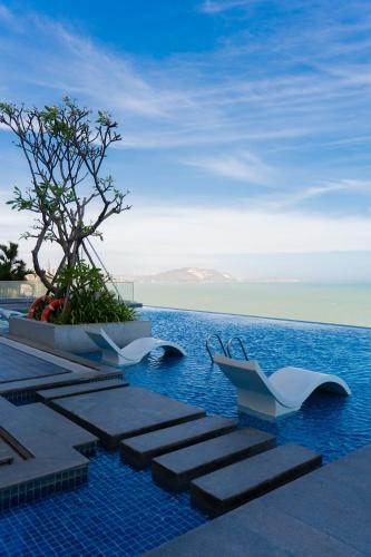 Suoi Nuoc Beach Hotel | Sunset Ridge Condotel Apec Mandala Mui Ne