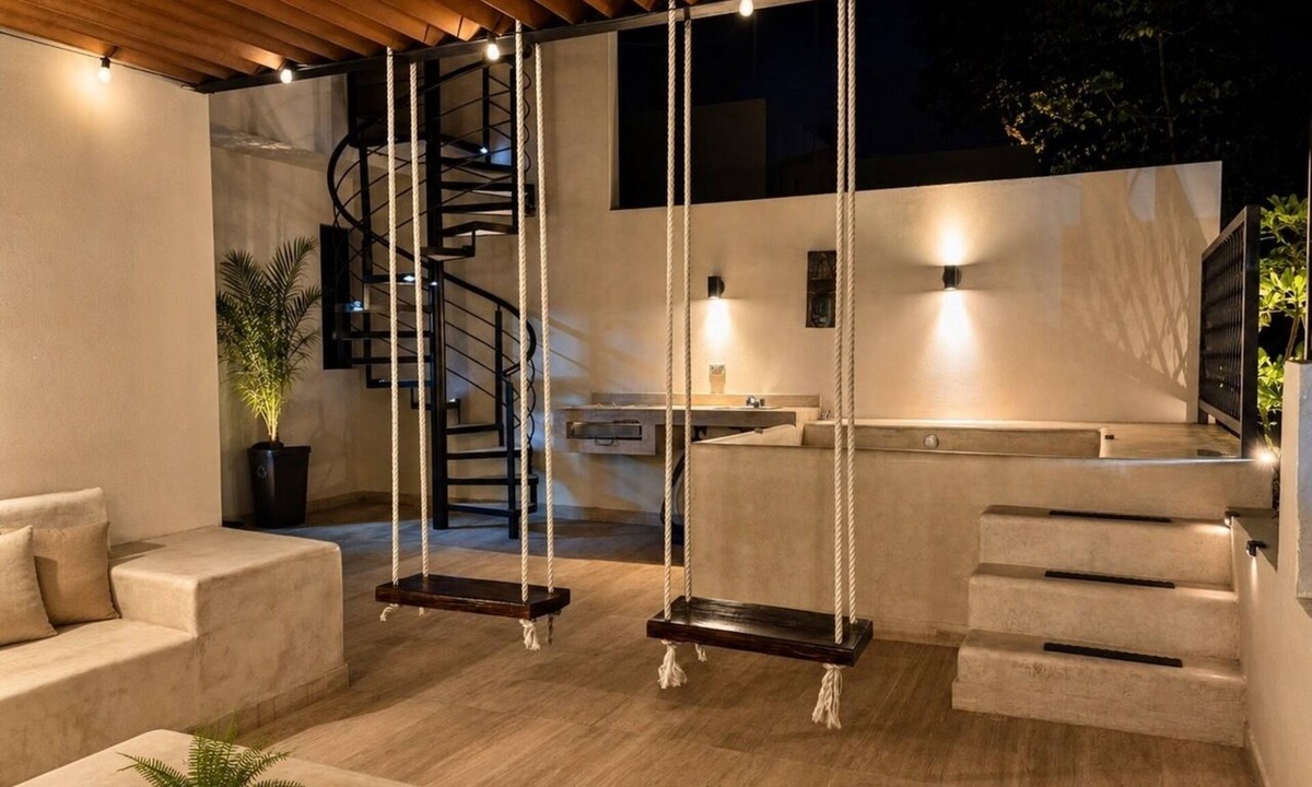 Zama Apartment | Your Tulum escape awaits by HEUSHAVEN. Relax in a private rooftop pool, enjoy tropical views from 3 balconies, 3 bedrooms with smart TV's, and stay minutes from beaches, cenotes, dining, and nightlife.