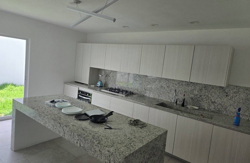 Pachuca House | 5-bedroom, 5-bathroom home with a rooftop garden offering panoramic views and a 2-car garage