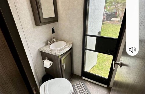 Lucas RV Rental | Black Fork River front fully functioning Camper