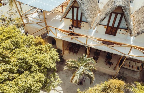 Downtown Holbox House | Casa Balam Holbox, 6 boutique, beach-style A-frame cabañas, fully equipped shared outdoor kitchen, self check in