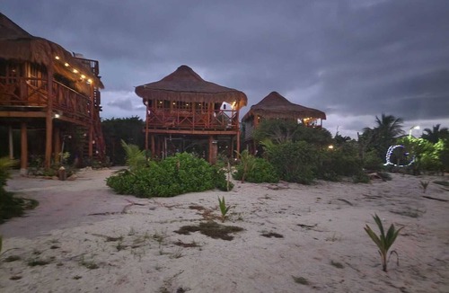 Merida Cabin | Casa Blanca where you can reconnect with nature & enjoy tranquility by the sea.