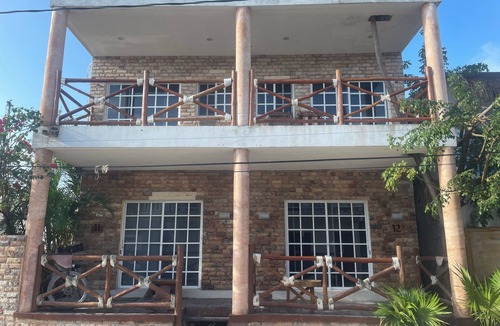 Downtown Holbox Apartment | Cozy apartment in charming Holbox with AC, WiFi cuarto en planta baja