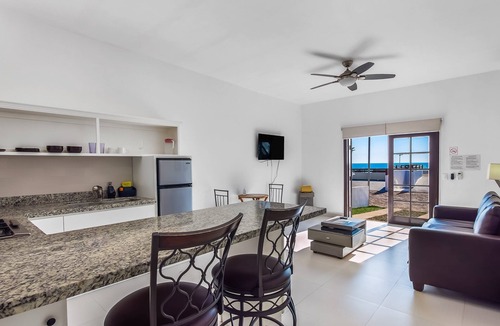 La Paloma Apartment | Dog-friendly beach haven with heated pool, hot tub, kitchenette, patio, AC