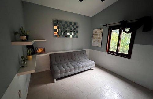 Xpujil House | House with a spacious yard surrounded by jungle and trees, ideal for families