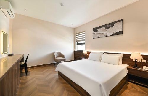 Tan An Hotel | Khách sạn Neva