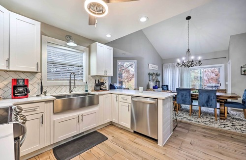 Rogers House | Lakefront Rogers Getaway w/Hot Tub & Deck!