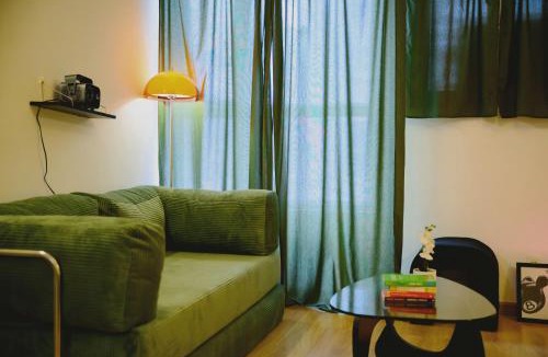 District 10 Apartment | Private Sage Green & Projector Studio In Center District 10