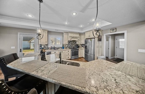 Doniphan House | River House on Violet Lane