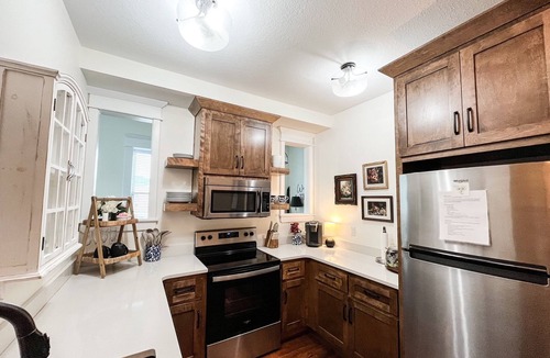 Excelsior Springs Condo | Spacious and Airy Loft/2 king beds/5 bed total/Overlooking Broadway Ave