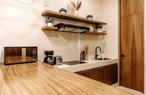 Zama Condo | Spacious modern 3-bedroom condo in Aldea Zama with premium finishes, a lush shared pool, and easy access to restaurants, shops, and Tulum’s beaches.