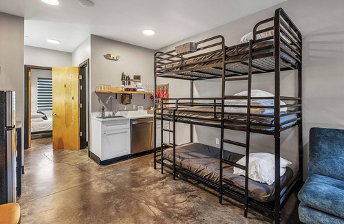 Pacific Hotel | Suite with kitchen near Six Flags and the St. Louis area in The Landing Hub Hotel with onsite activities