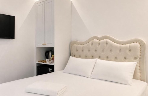 Trung Phung Hotel | The QH Boutique Hotel - Trung Phụng