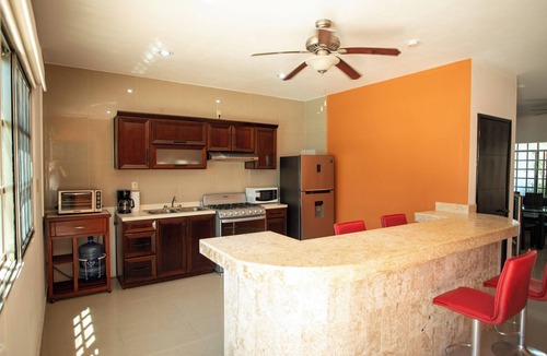 Chicxulub Puerto Villa | Twin villas for large groups, 1 block from beach