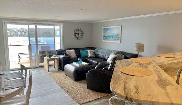 Beautiful, Spacious, Lake Front Condo, 4 full bathrooms, sleeps 10-12. in East Jordan