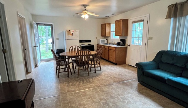 Enchanting cabin with on 2.5 acres in Hubbard Lake in Hubbard Lake