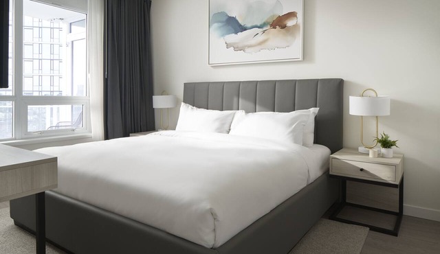 Luxury 2-BR ADA Suite w/Pools, Gym, Gourmet Kitchen & Prime Seattle Location! in Seattle