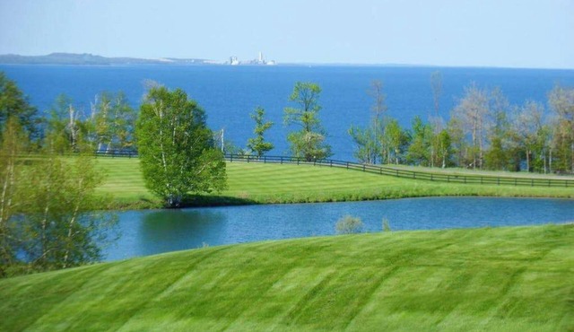 Scenic bay view home w/a full kitchen + family-friendly in Harbor Springs