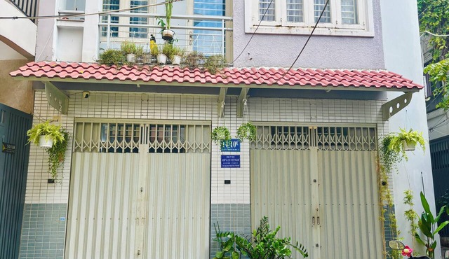Snoopy Home Calmette - Central HCMC Homestay with Kitchen & Balcony
