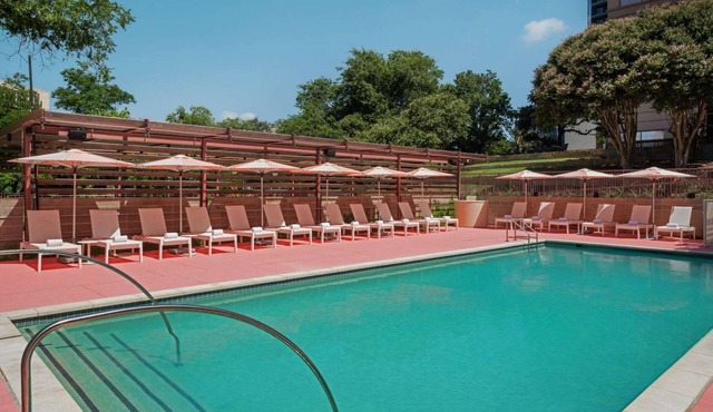 Steps to Texas Capitol + On-site Dining. Pool. Gym in Austin