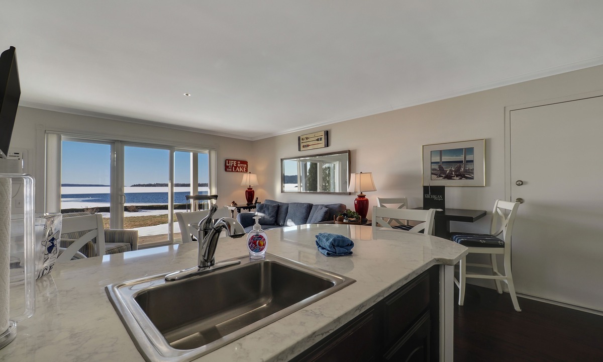 Boyne City Condo | 114 Water Street | Private Patio on Lake Charlevoix | Ground Floor Getaway
