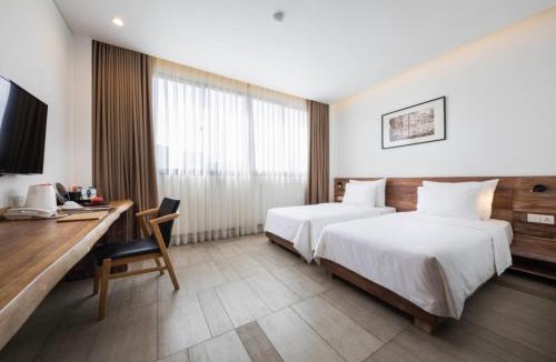 Nguyen Thai Binh Hotel | Triple E Hotel Fine Art Museum